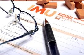 IMU sui capannoni: non è il Comune a poter differirne il versamento